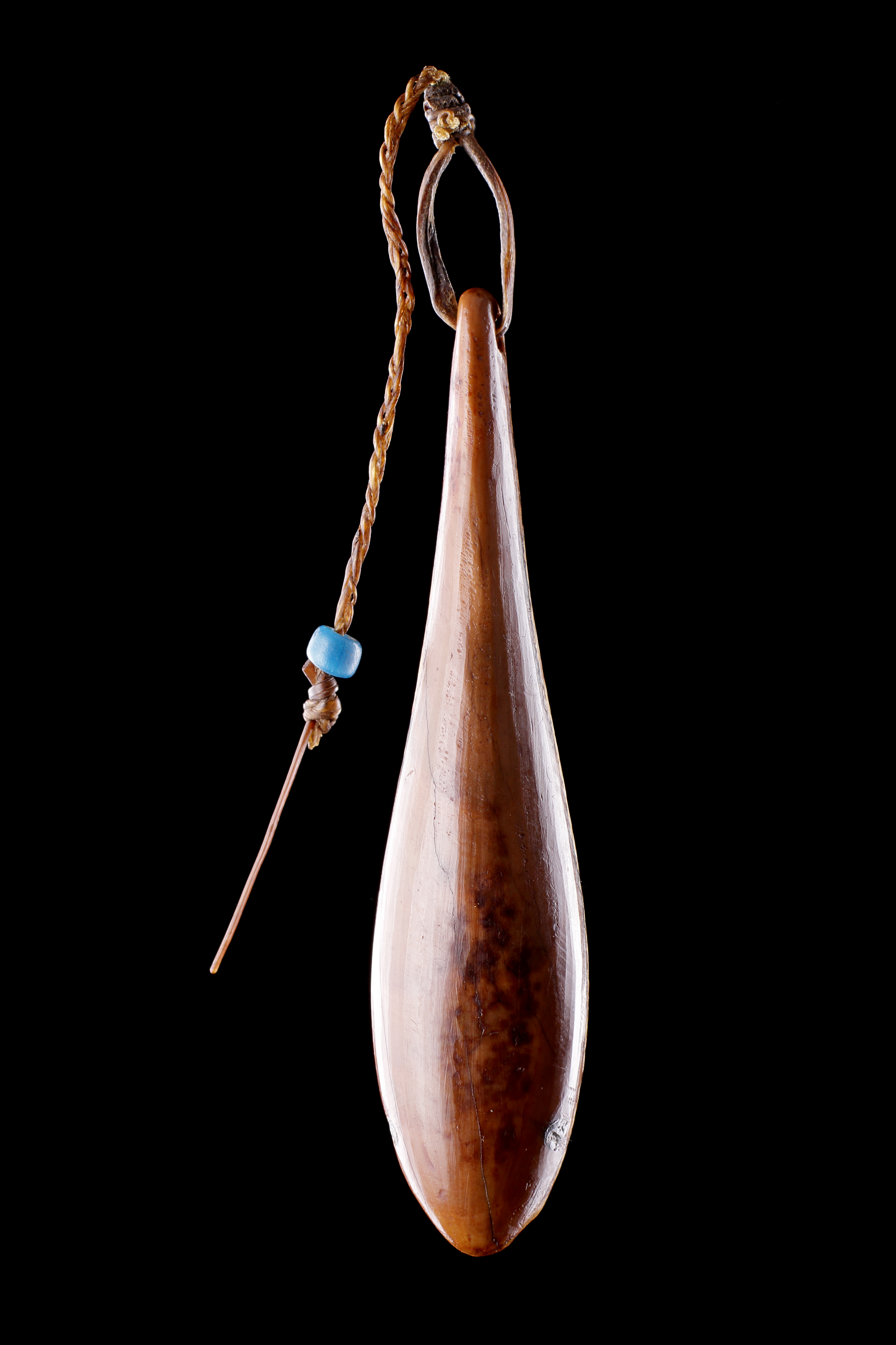 An Inuit Fishing Lure with Sinnet and Blue Glass Bead